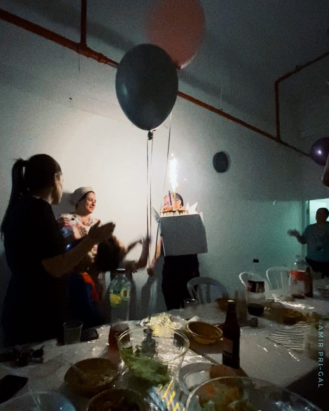 A birthday celebration in a service room — not an unusual sight in Israel. The candle’s glow flickers like a fragile moment of hope in the midst of uncertainty. We long for peace, yet reality demands our presence. For how long? No one knows. Still, we carry on.
#CandleInTheDark #UrbanRawness #BirthdayInUnusualPlaces #IndustrialVibes #LightInTheShadows #EverydayIsrael
#MomentsThatMatter